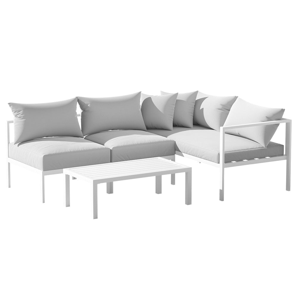 Coolangatta white aluminium outdoor sofa set in an outdoor setting