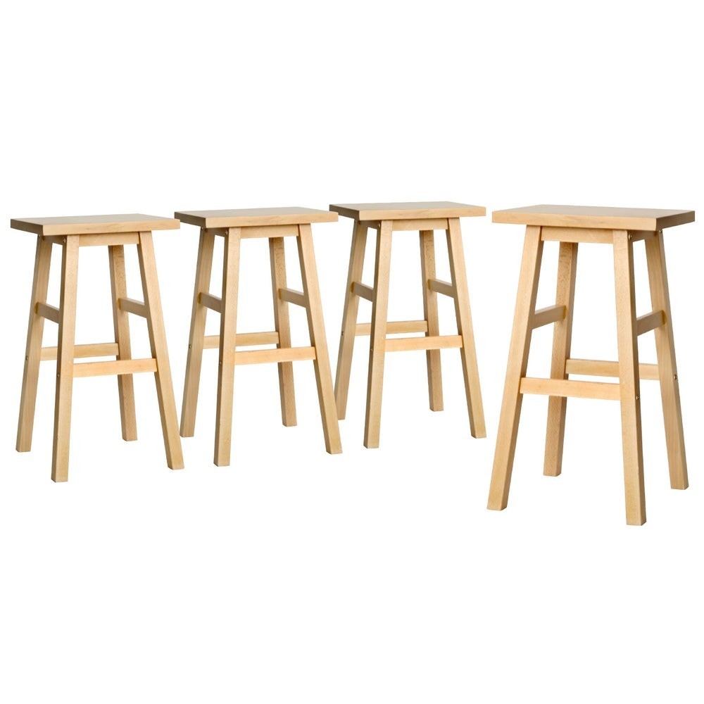 McCrae natural solid beech wood bar stool with saddle seat in a kitchen