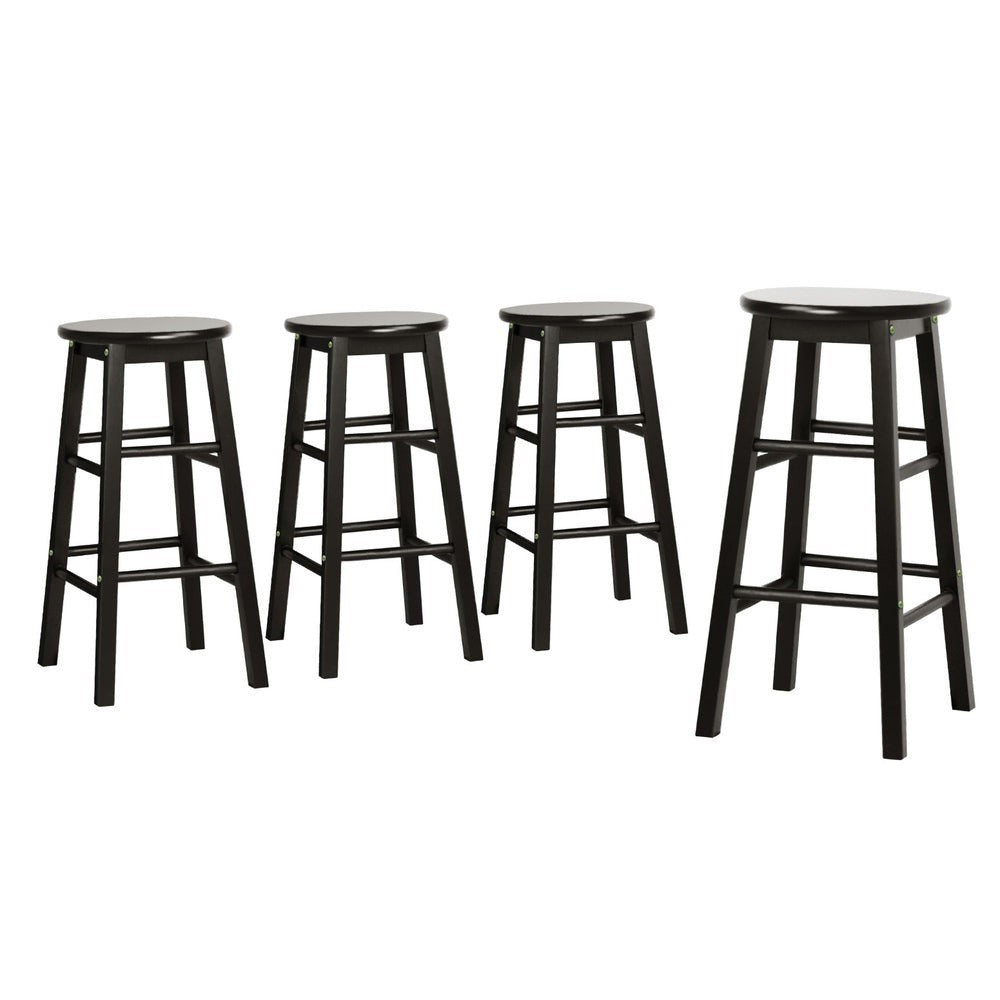 Shelly Beach black beech wood bar stool with round seat in a kitchen