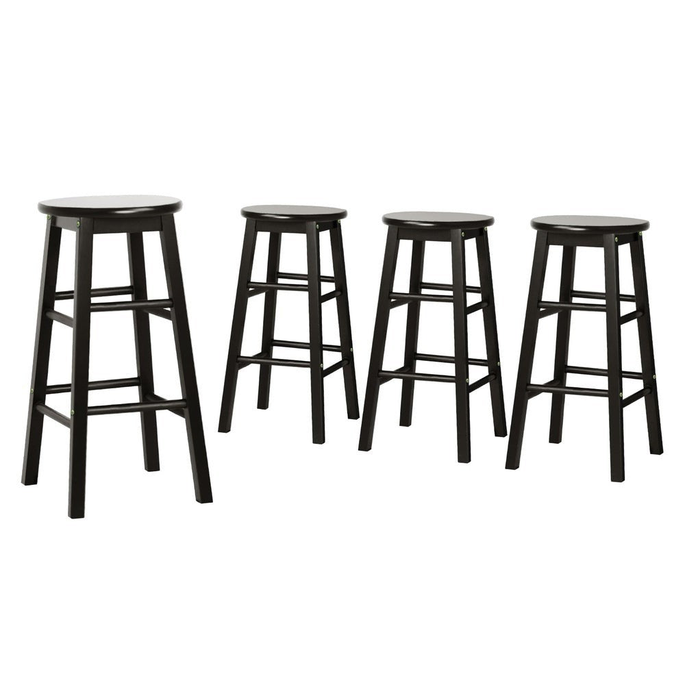 Shelly Beach black beech wood bar stool with round seat in a kitchen