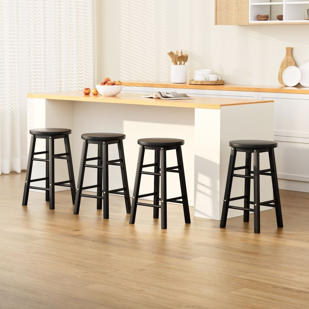 Shelly Beach black beech wood bar stool with round seat in a kitchen