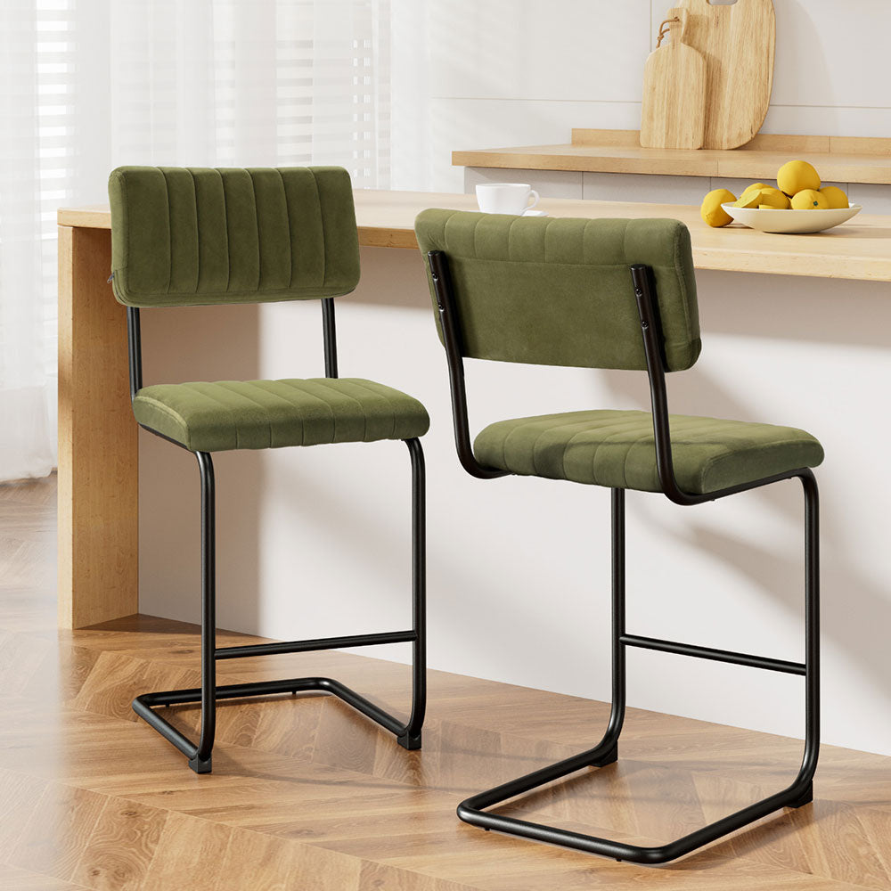 Somers green velvet bar stool 2pcs set with metal legs at a kitchen island