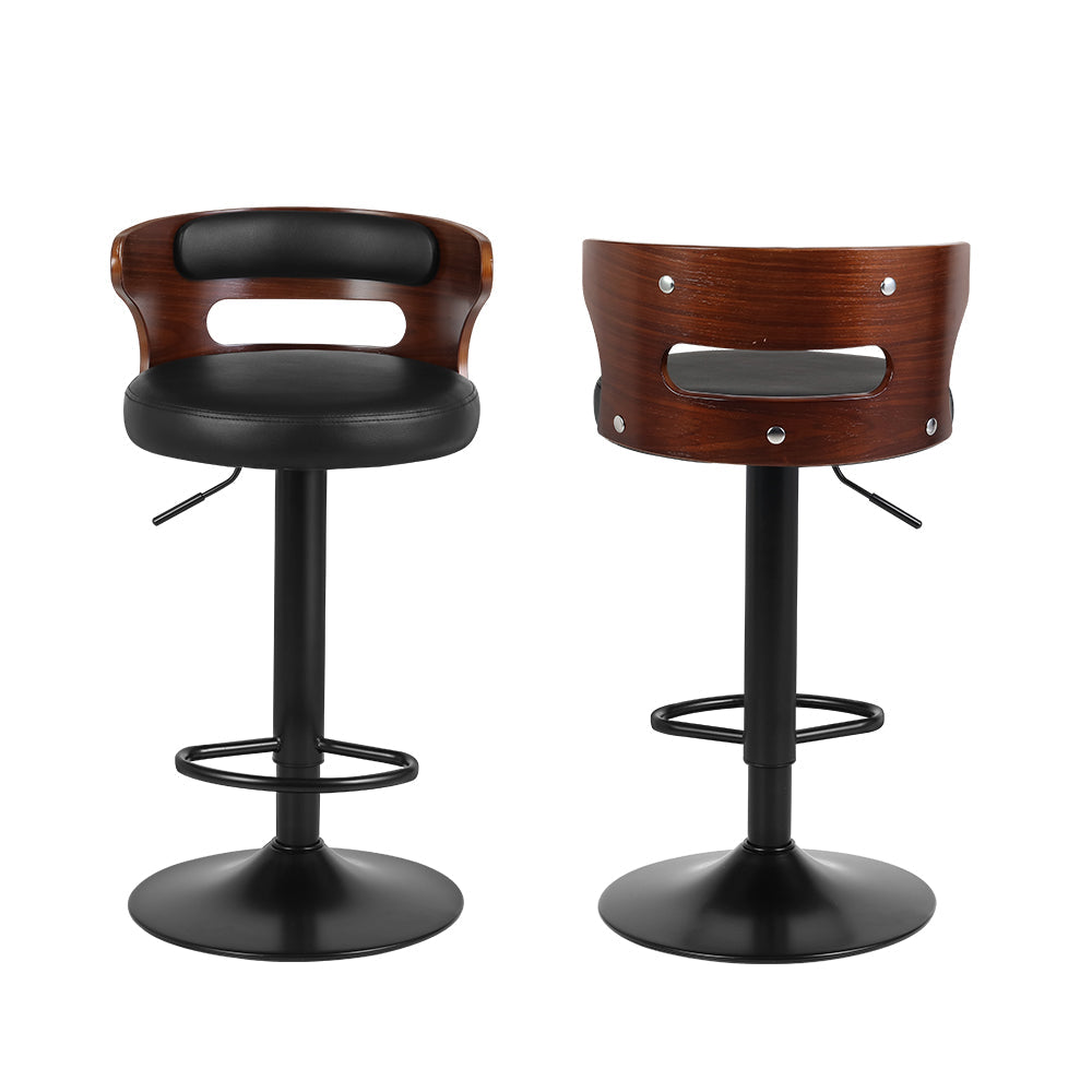 Seaford North black gas lift bar stool with padded mid back seat at a kitchen counter