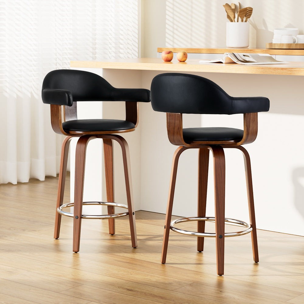 Glen forbes wooden leg bar stool black in a modern kitchen