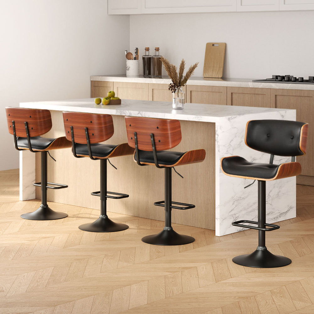 Blind Bight black gas lift swivel bar stool with chrome base in a modern kitchen