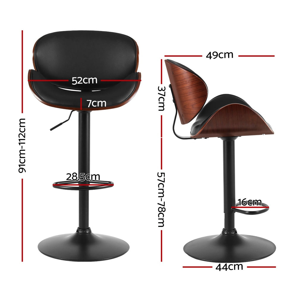 Carrum Downs black gas lift bar stool with padded leather seat at a kitchen counter