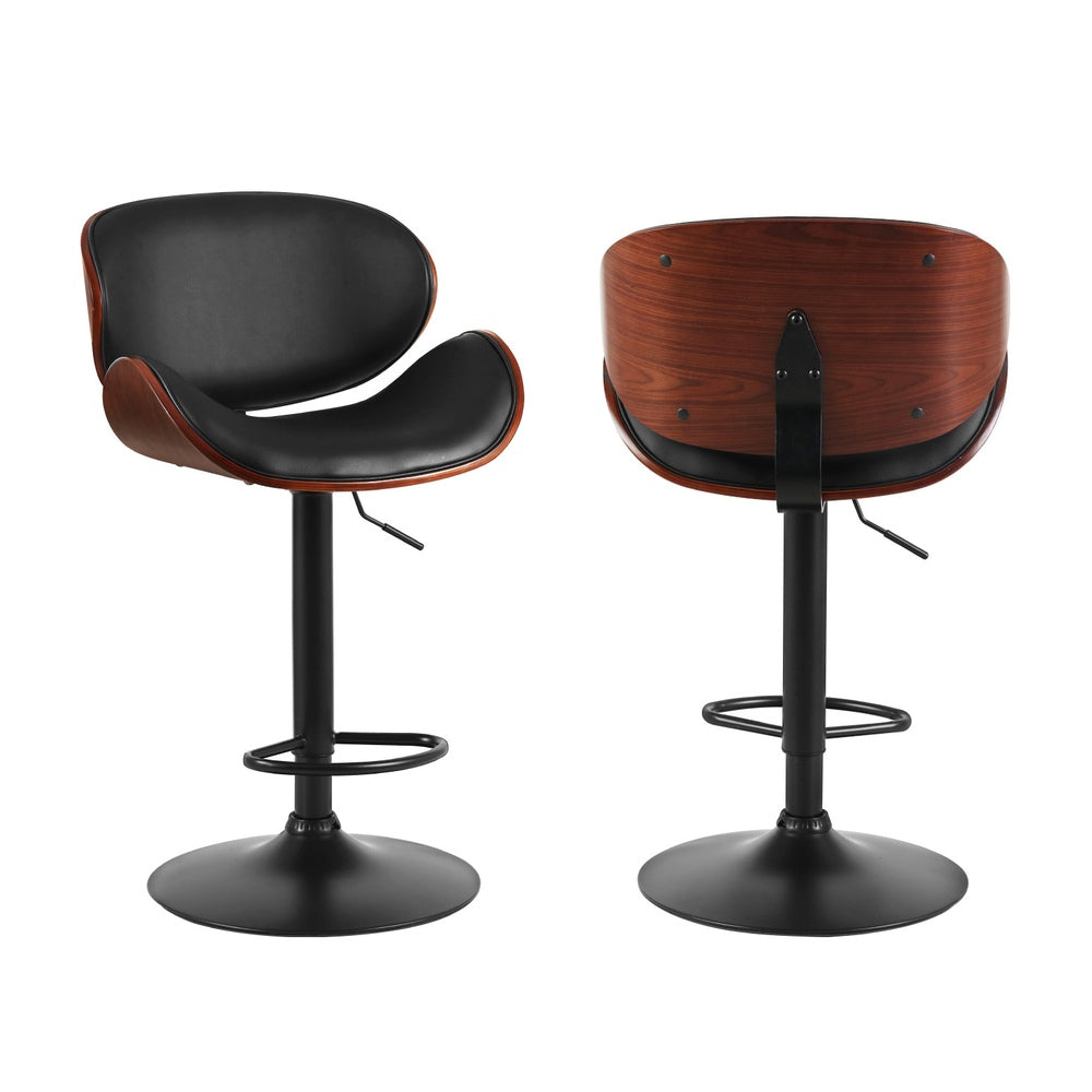 Carrum Downs black gas lift bar stool with padded leather seat at a kitchen counter