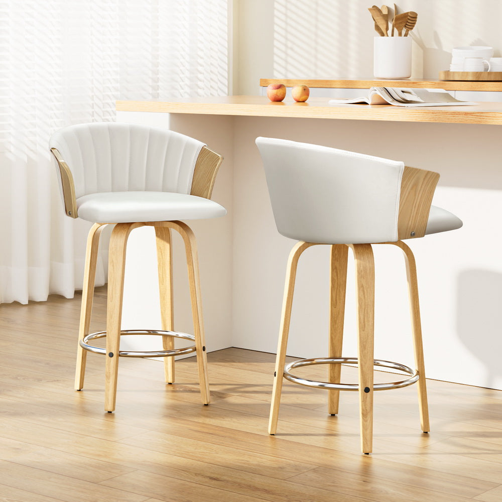 Mornington white faux leather bentwood swivel bar stool in a modern kitchen