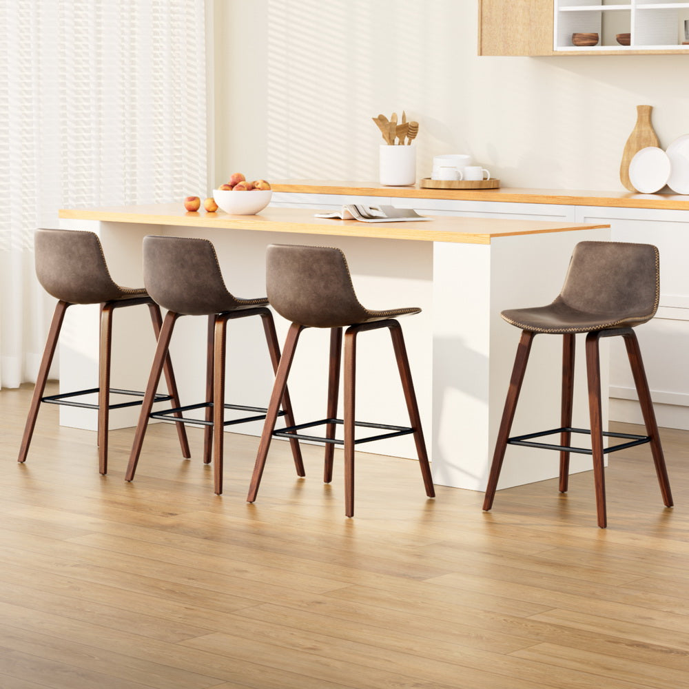 Four Artiss vintage wooden bar stools in cafe-style setting — Allure Home Collections