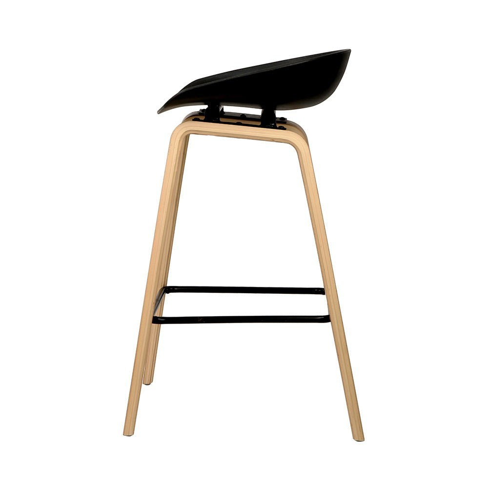 London Bridge black wooden bar stool with moulded seat at a kitchen counter