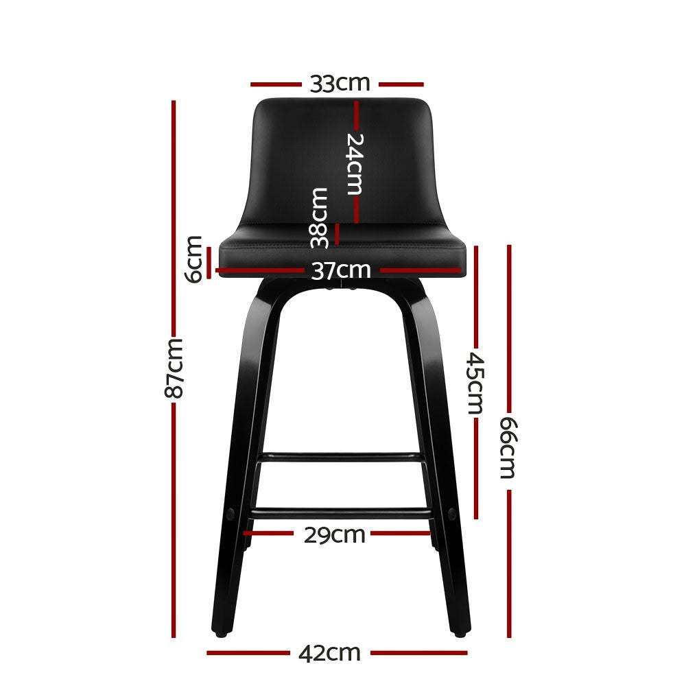 Balcombe black swivel wooden bar stool with padded seat in a modern kitchen