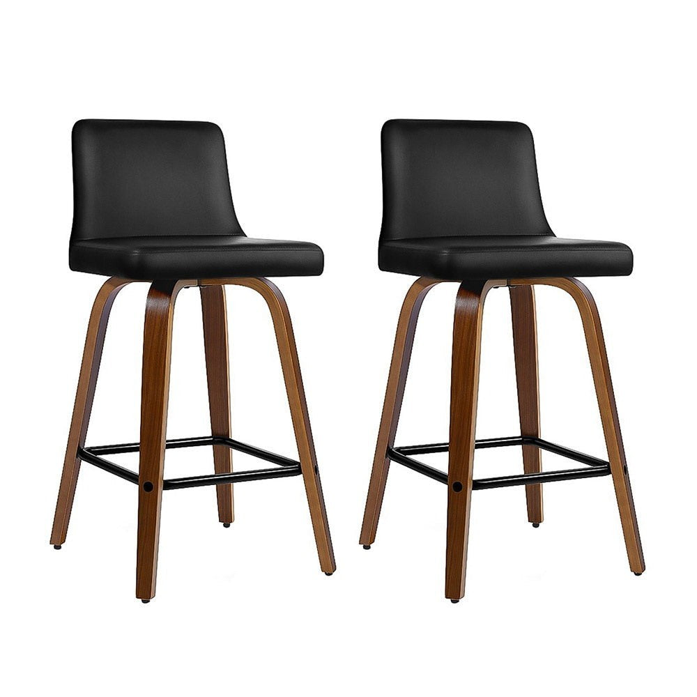 Balcombe walnut swivel wooden bar stool with padded seat in a modern kitchen