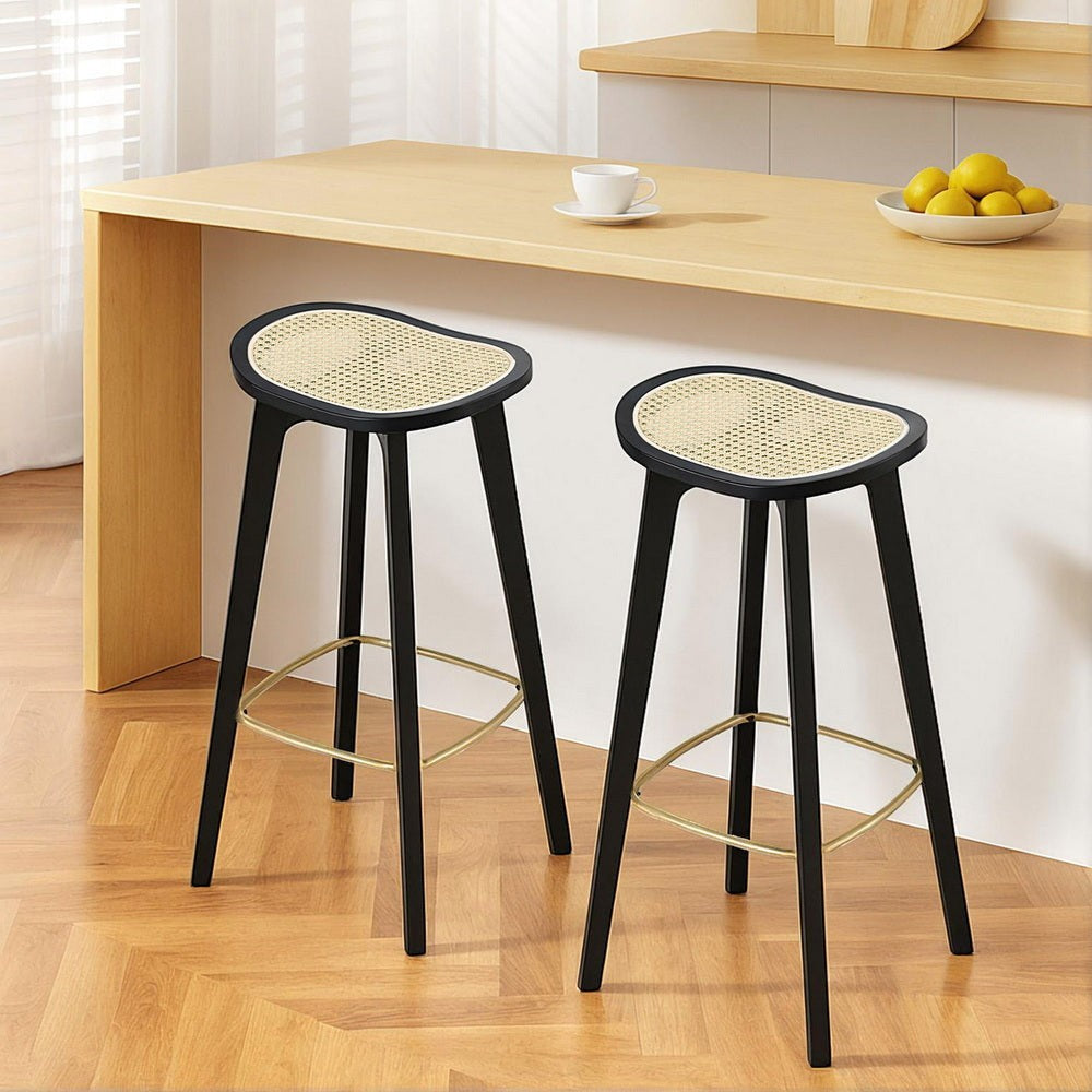 Grantville backless woven rattan bamboo bar stool at a kitchen counter