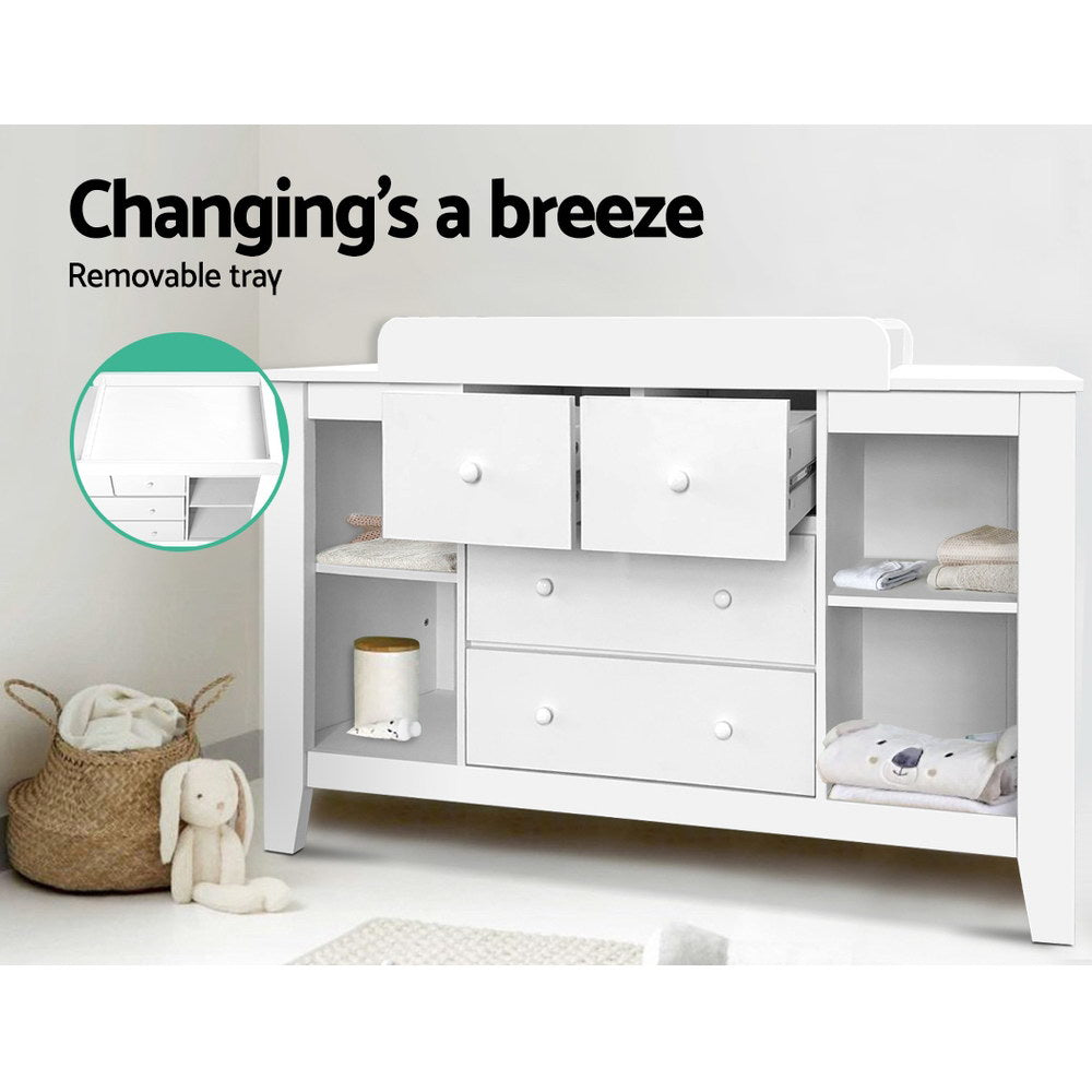 White baby change table with four drawers and four open shelves