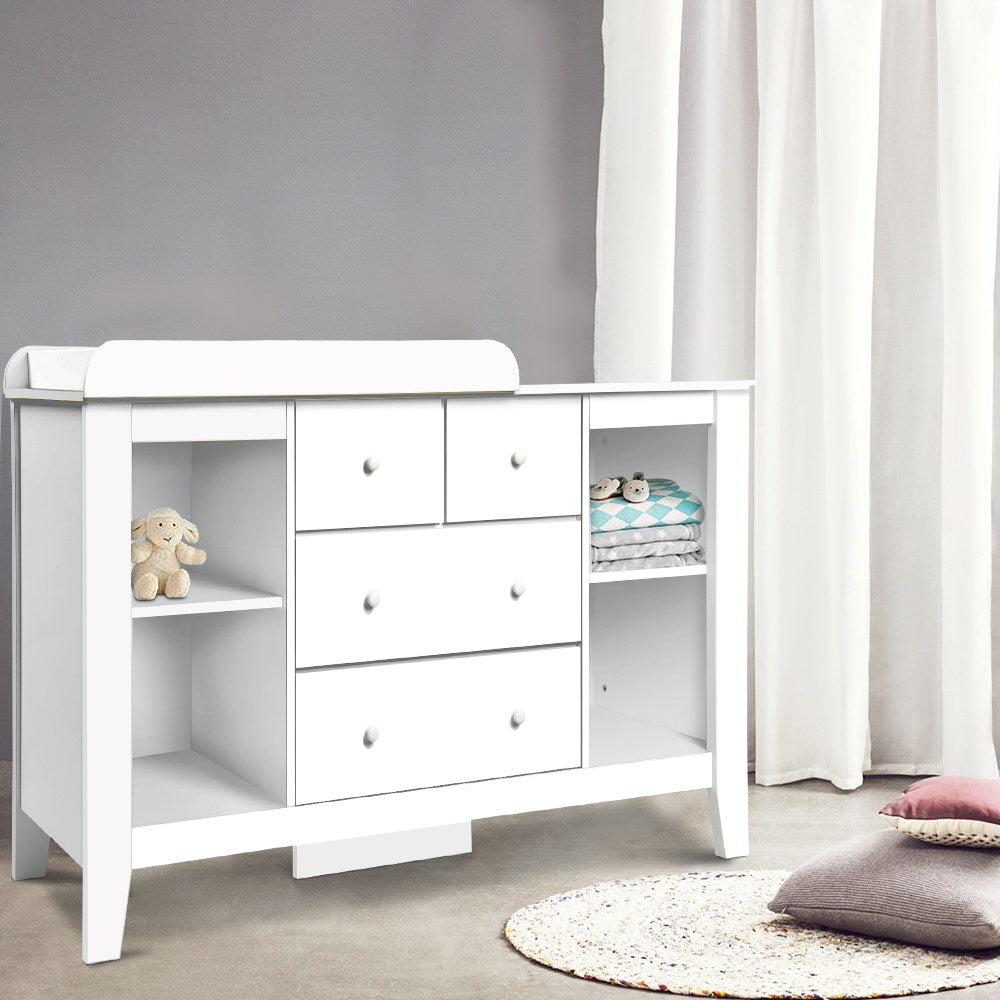 White baby change table with four drawers and four open shelves