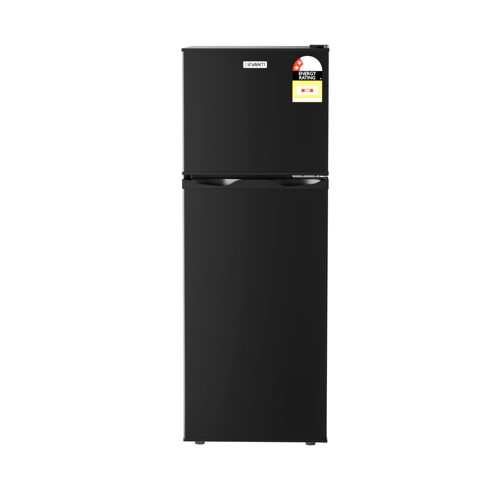 Freezer compartment of the 122 L bar fridge holding frozen food
