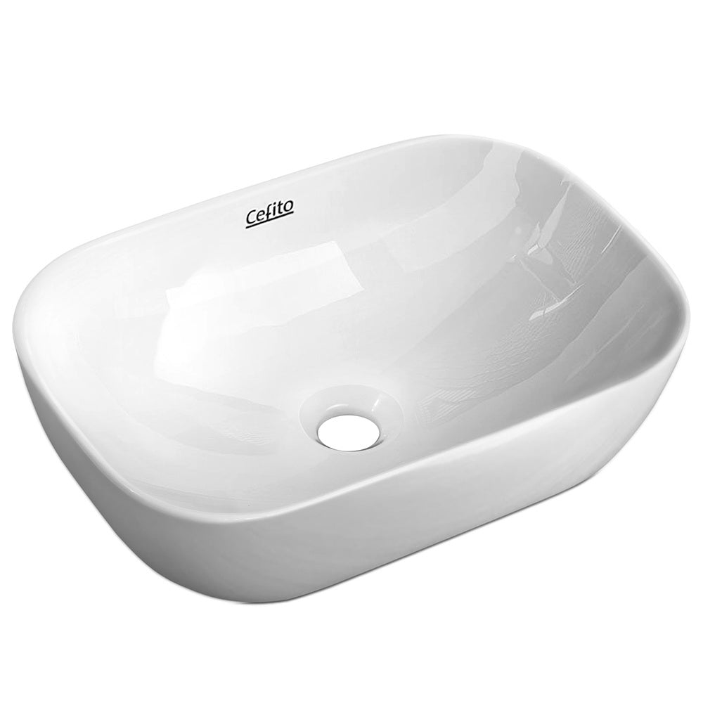 Oval ceramic vessel basin in gloss white, 46x33cm above counter basin