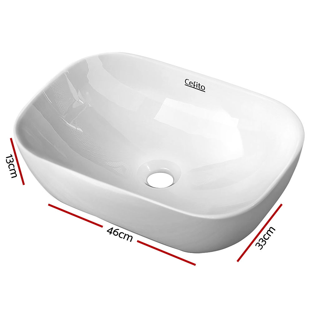 White high gloss oval ceramic above counter basin, front view, 46x33cm