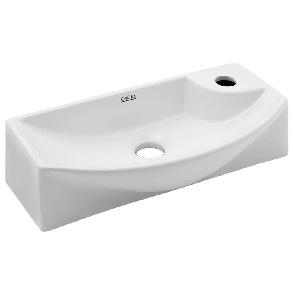 Compact white wall hung ceramic basin, 46x22cm with tap hole