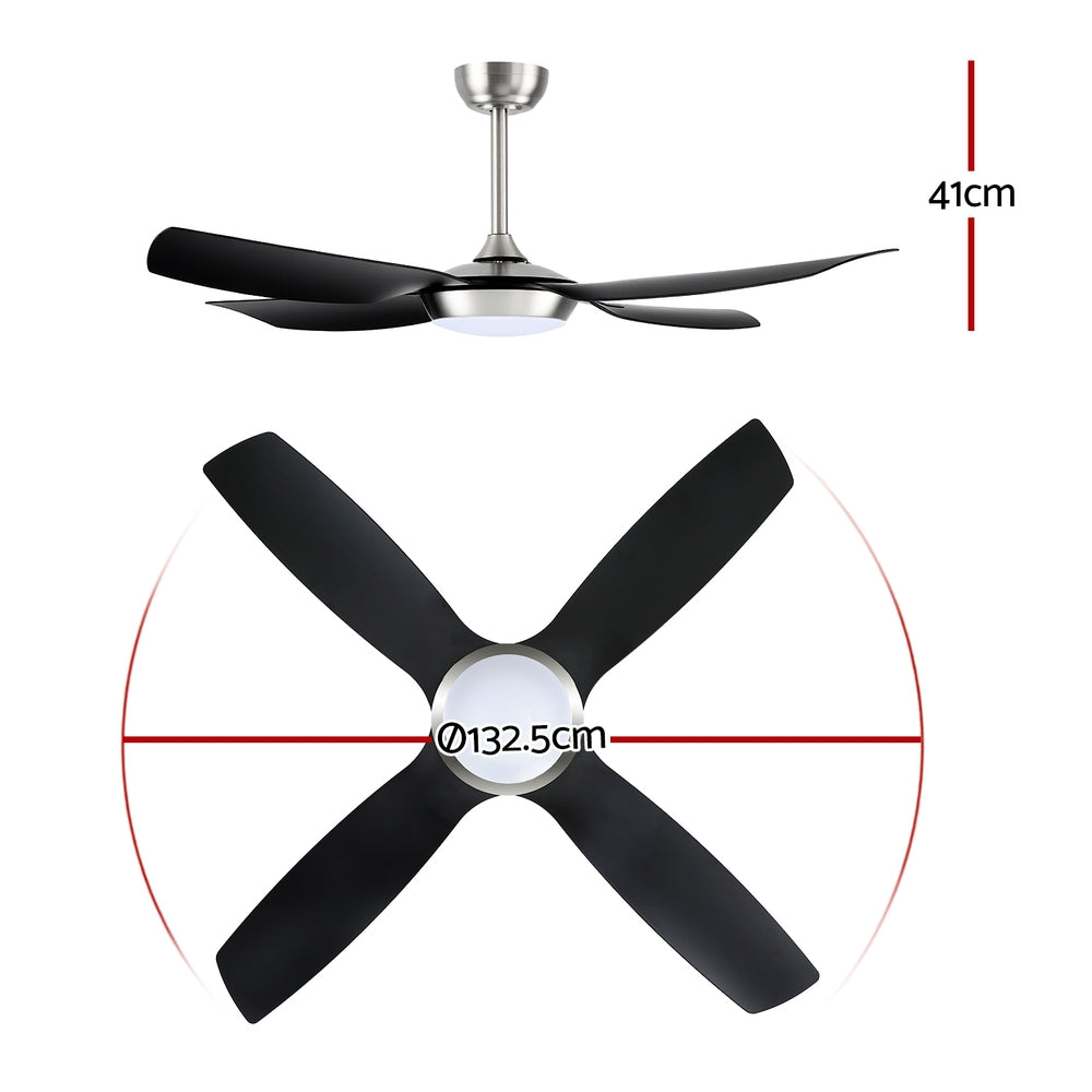 Black and silver four blade ceiling fan mounted in a living room