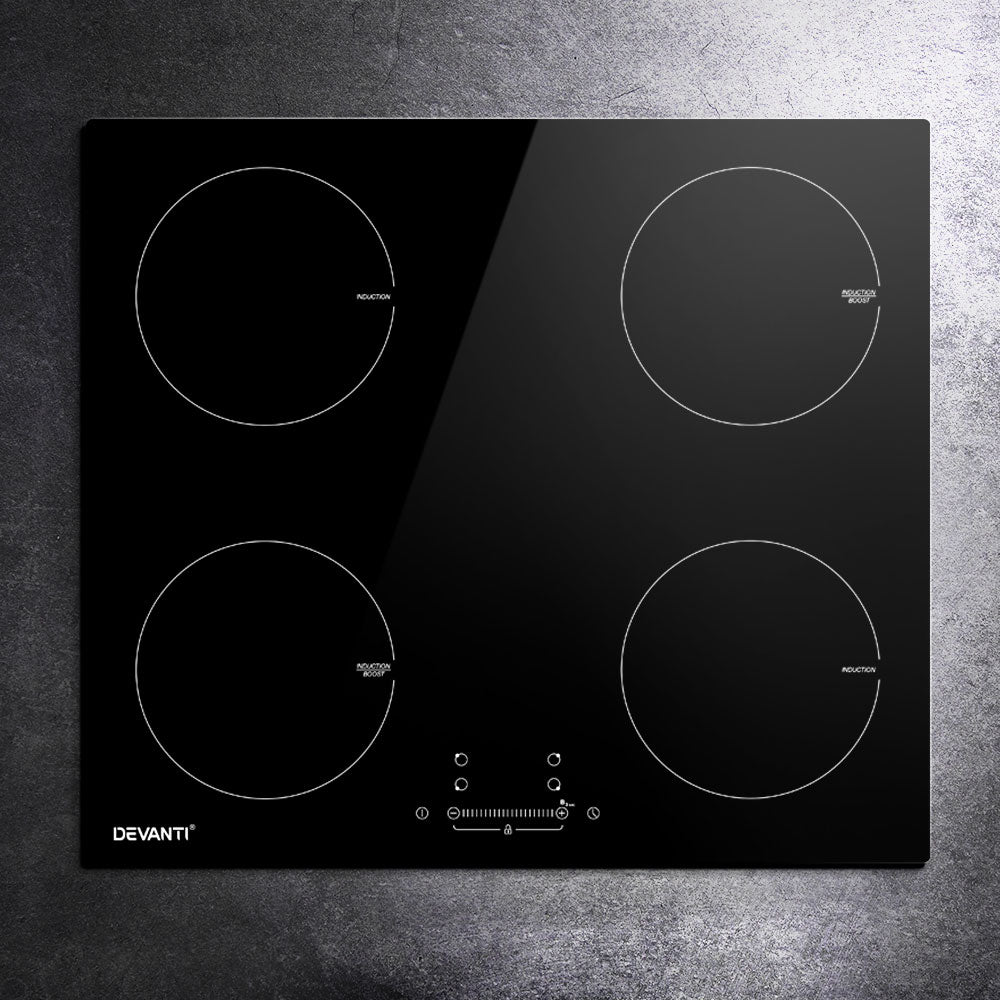 Detail of child lock, timer and boost function controls on the induction cooktop