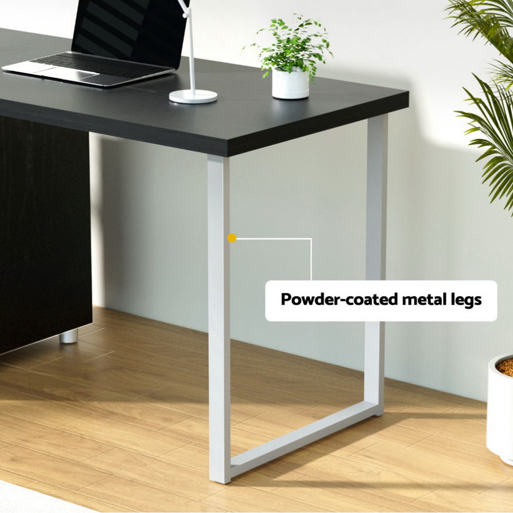 Campbell black computer desk with three drawers in a home office