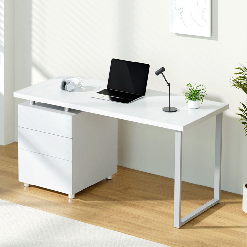 Campbell white computer desk with three drawers in a home office