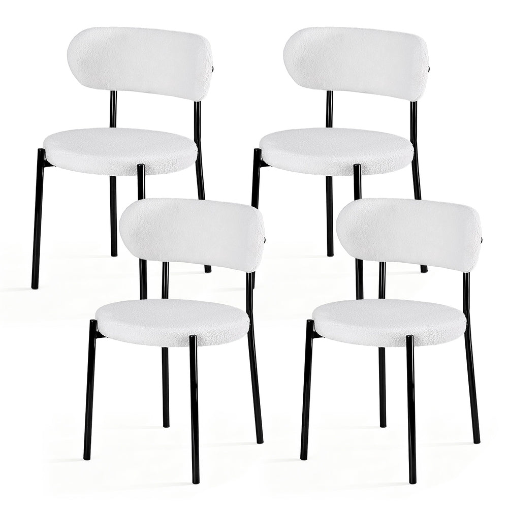 Stirling white sherpa boucle dining chairs with curved backrest in a modern dining room