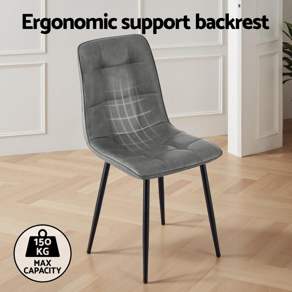 Krondorf grey faux leather dining chair in a modern dining room