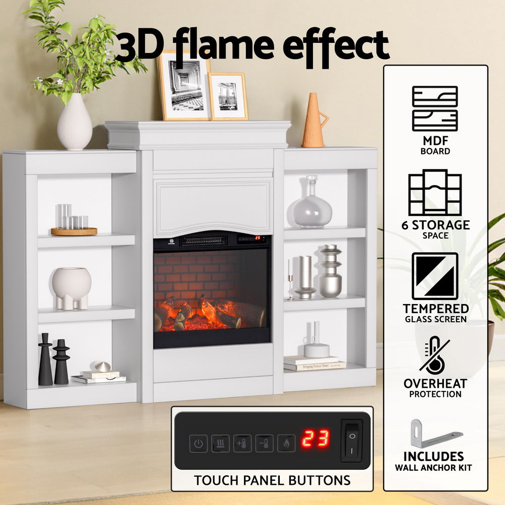 White electric fireplace styled in a living room with books on the shelves