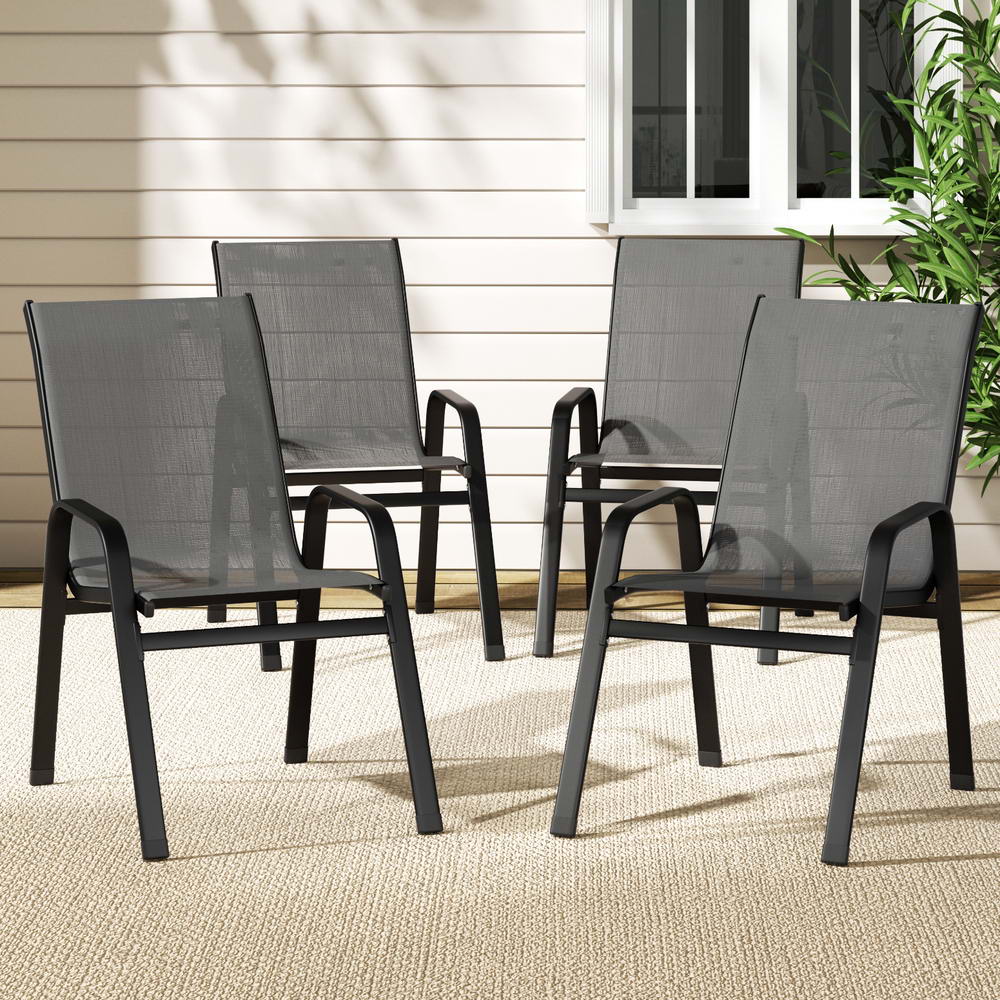 Berry grey textilene stackable outdoor chairs on a patio