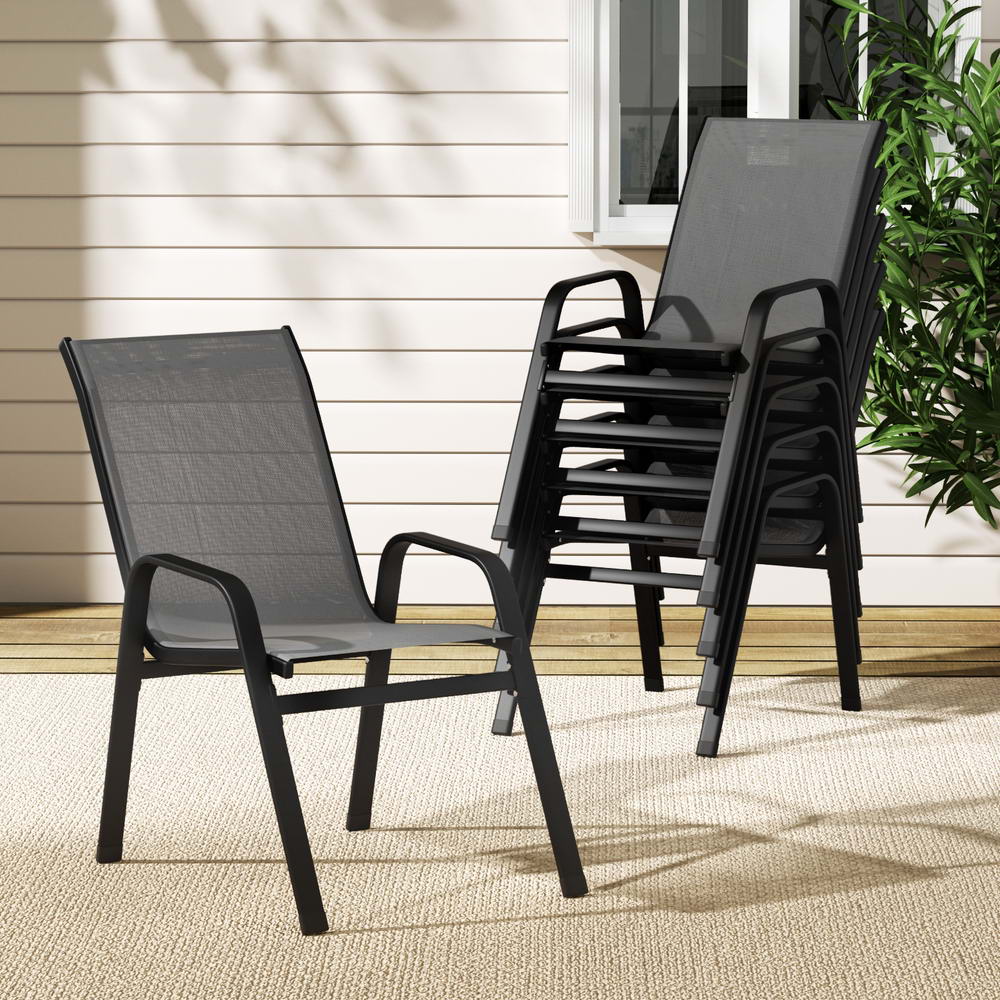 Berry grey textilene stackable outdoor chairs on a patio