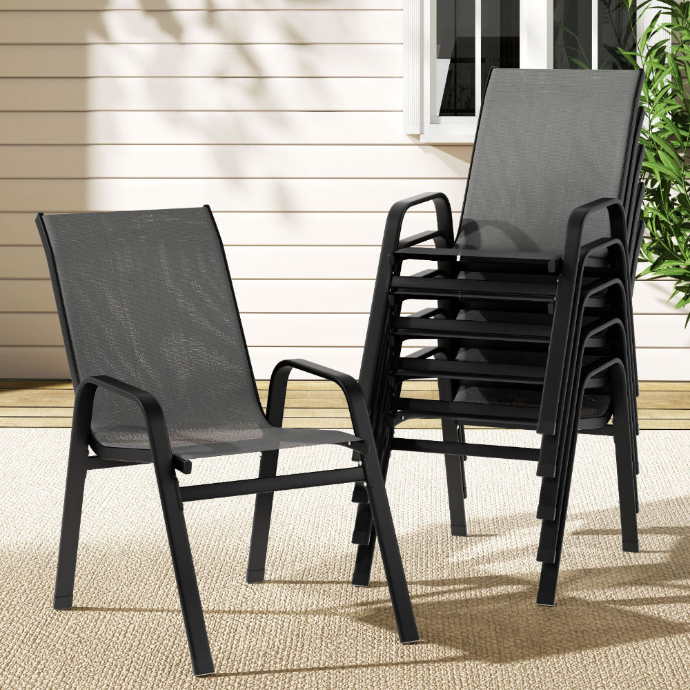Berry grey textilene stackable outdoor chairs on a patio