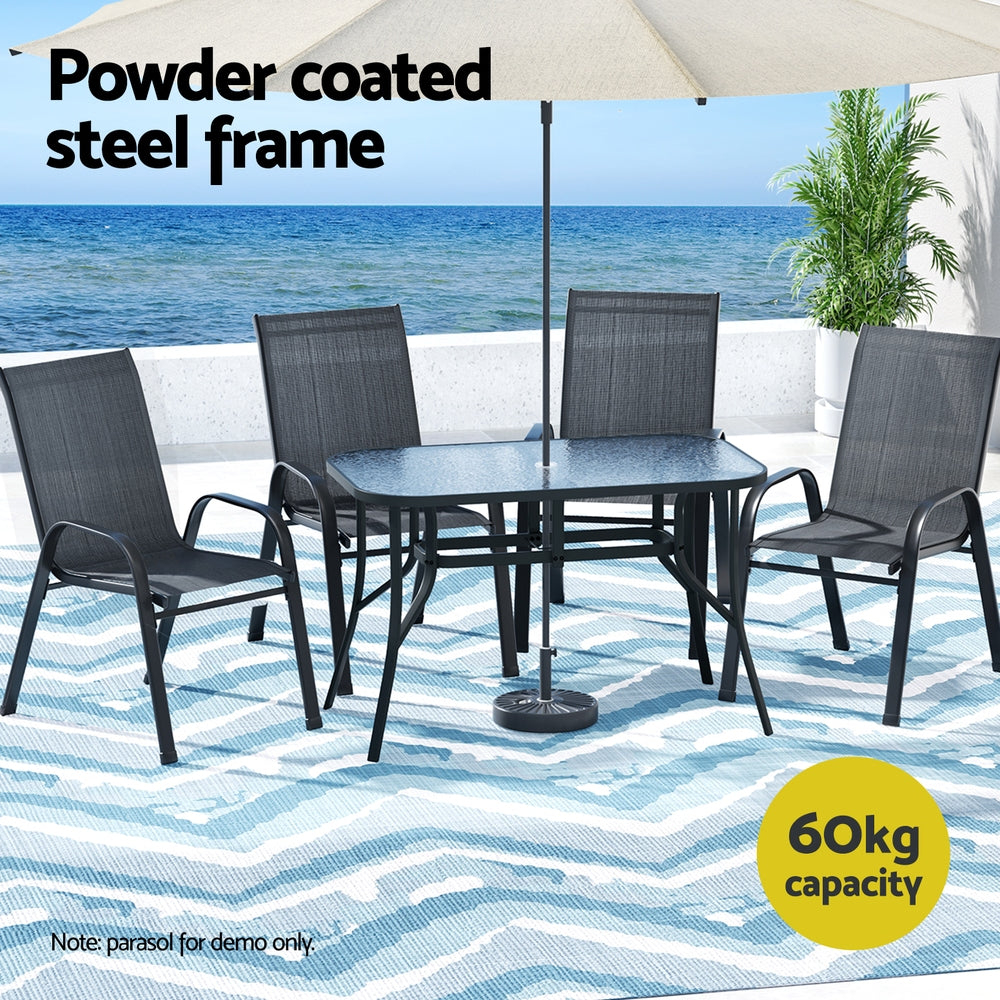 Five piece outdoor dining set with 120cm glass table and four black Textilene chairs