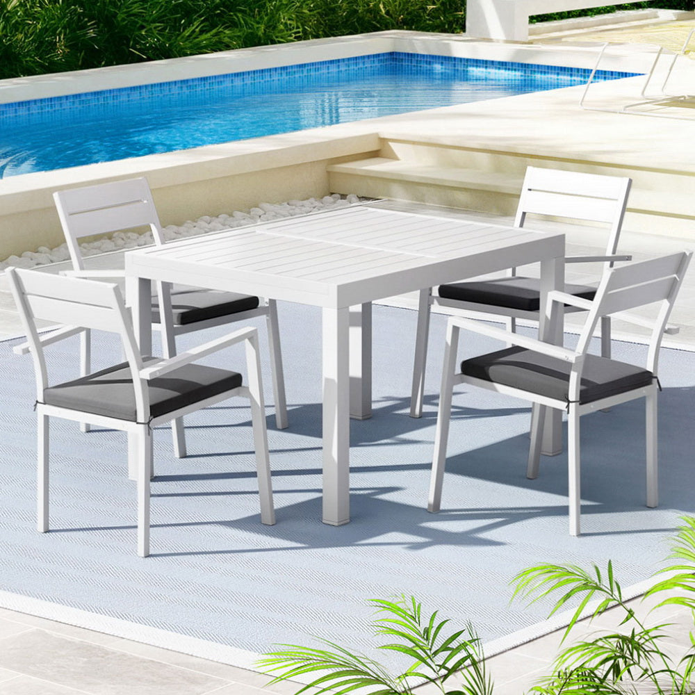 Five piece white extendable aluminium dining set