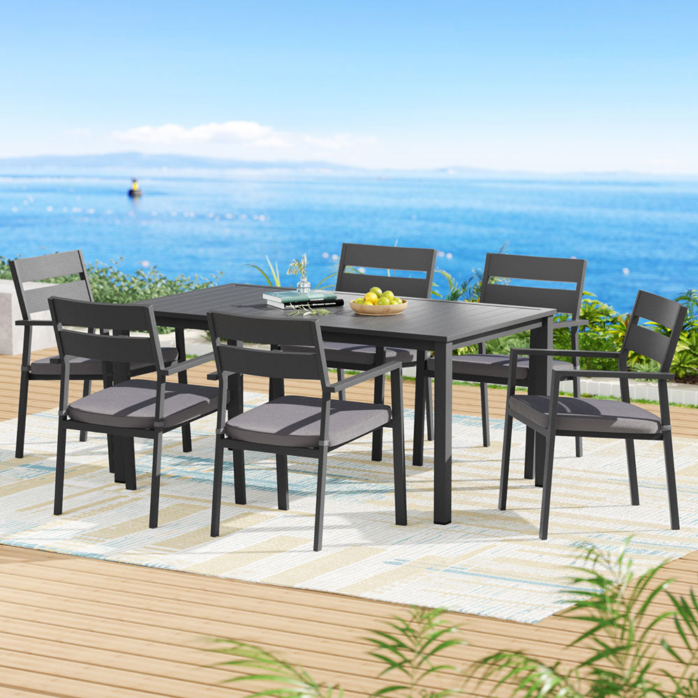 Black seven piece aluminium outdoor dining set