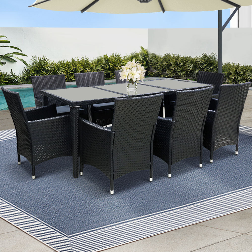 Bargara black wicker outdoor dining set in an outdoor setting