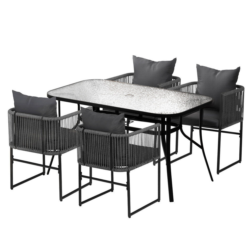 Paracombe black rope and glass dining set in a modern dining room