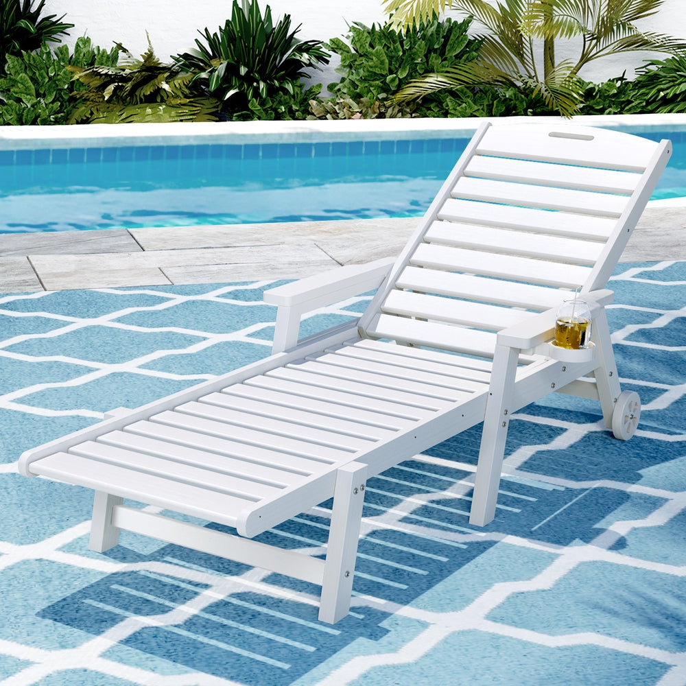 Kiama white HDPE sun lounger with wheels reclining on a patio