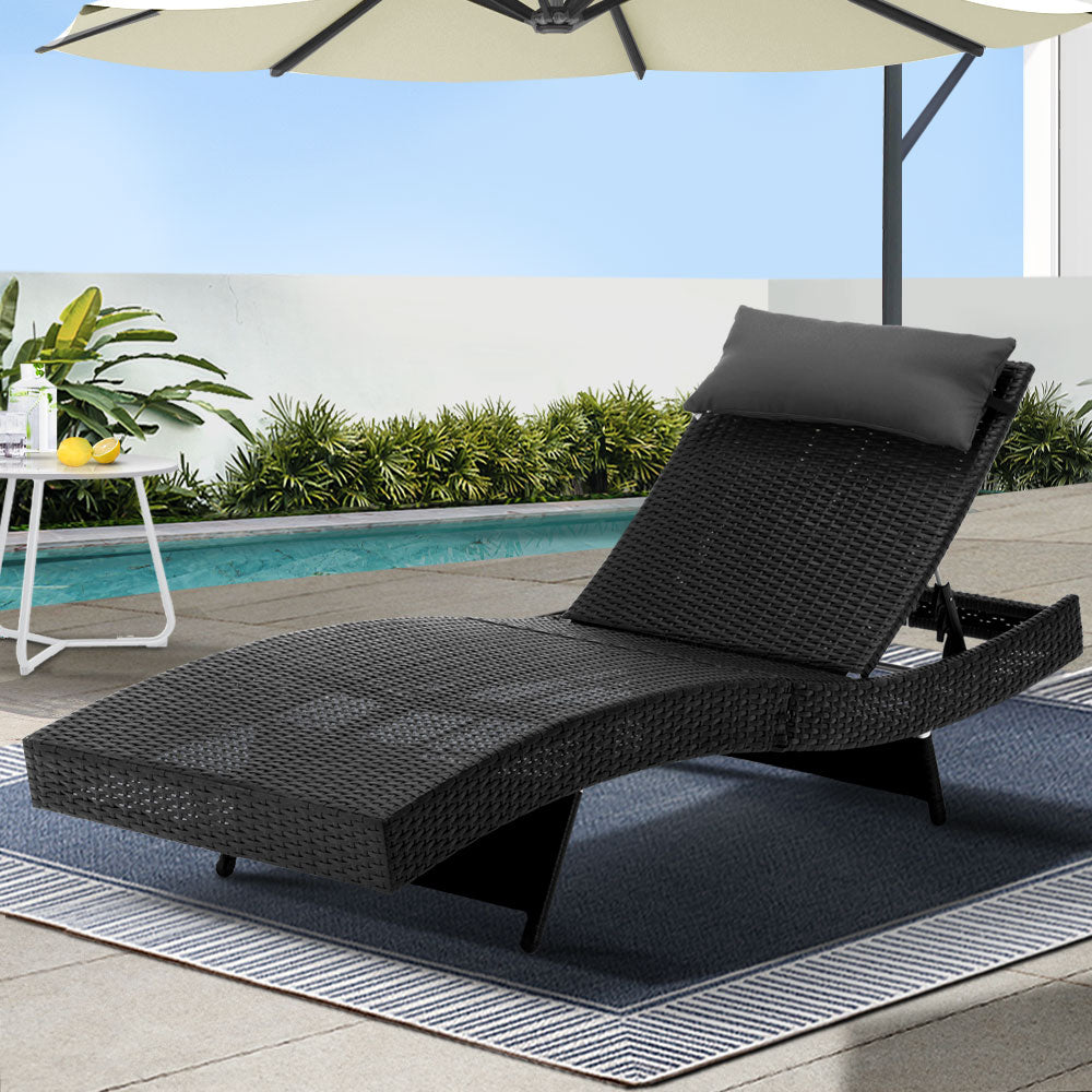 Agnes Water black wicker sun lounge in an outdoor setting