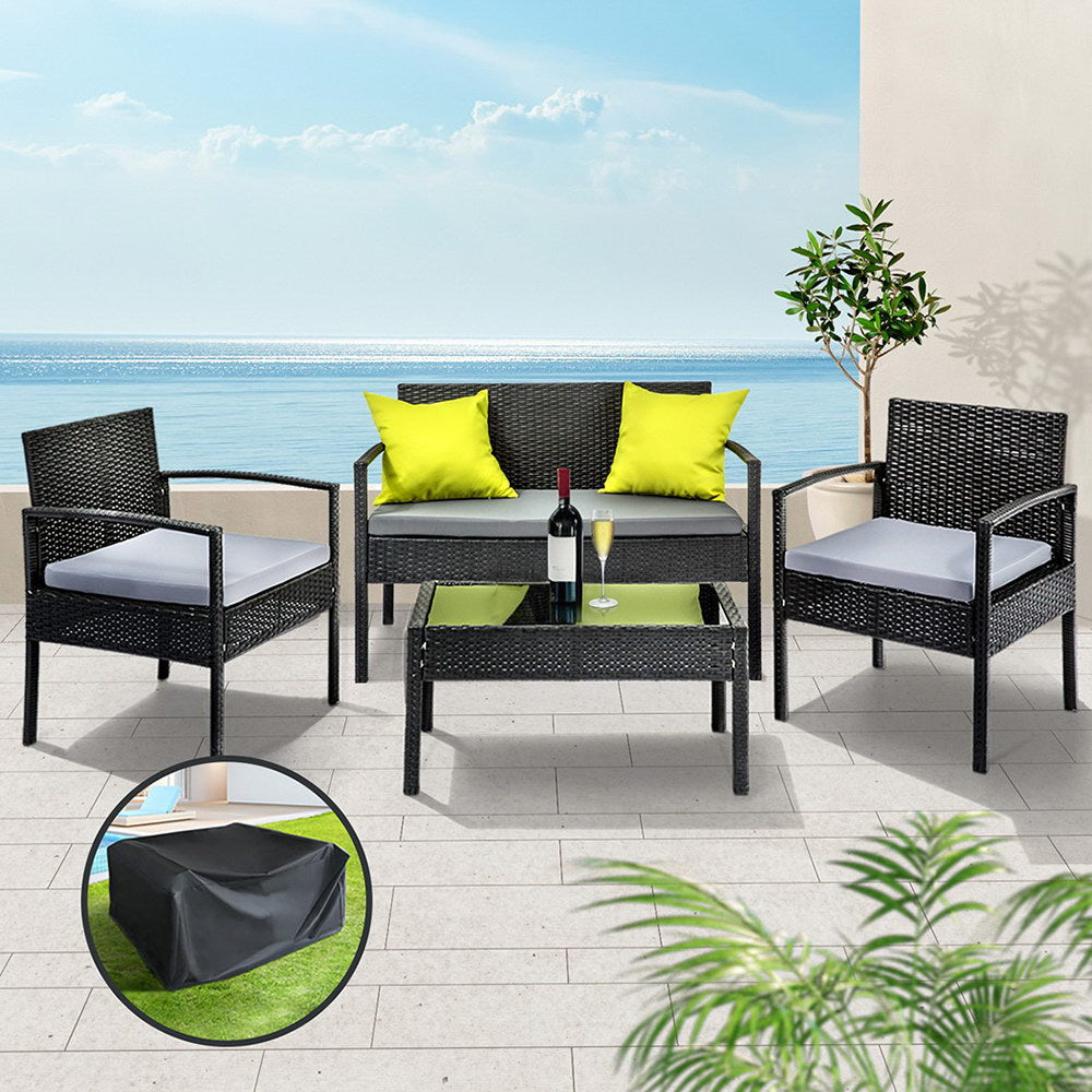 Tin Can Bay black wicker outdoor sofa set in an outdoor setting