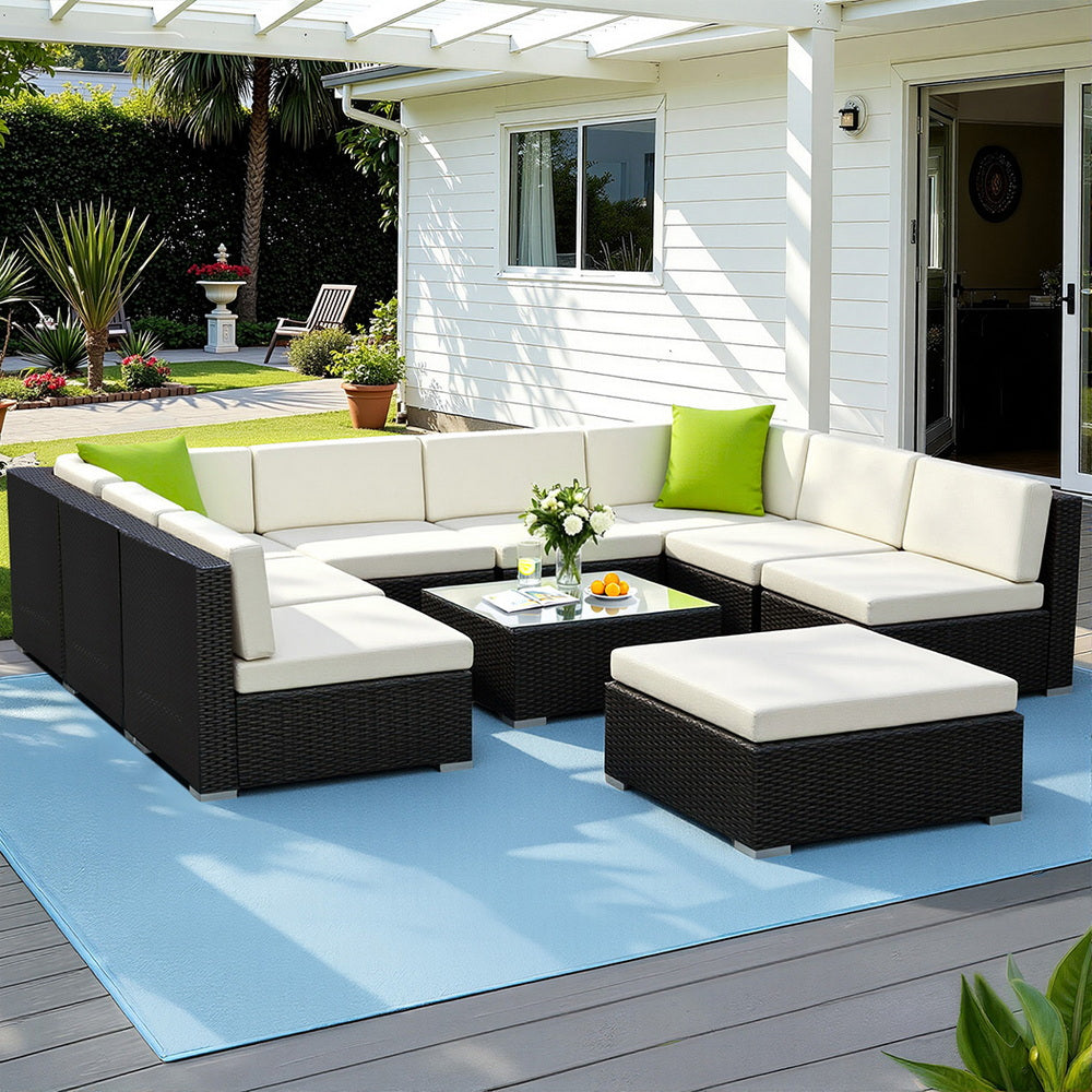 Hervey Bay black wicker outdoor corner lounge set in an outdoor setting