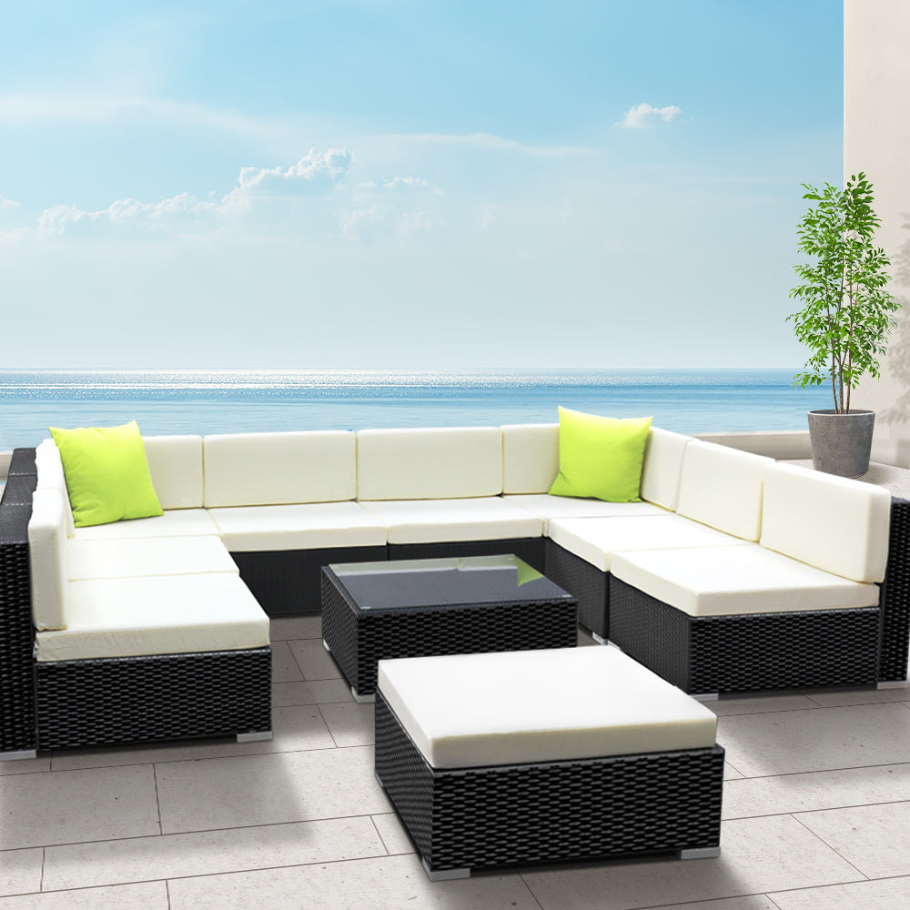 Hervey Bay black wicker outdoor corner lounge set in an outdoor setting