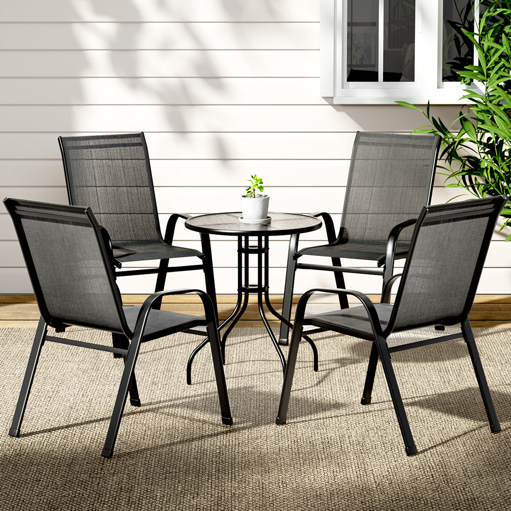 Bucasia black steel outdoor dining set in an outdoor setting