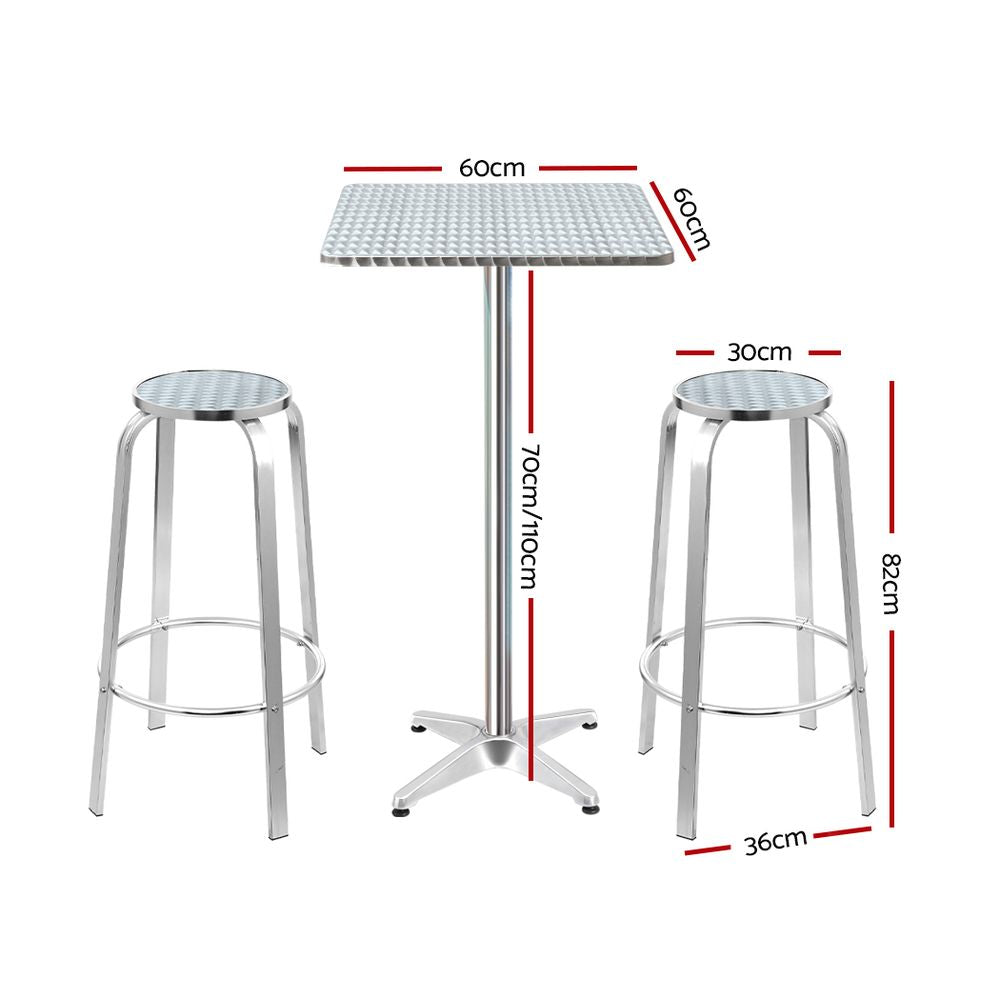 Black Rock silver aluminium 3 piece outdoor bar set with two stools and adjustable table on a patio