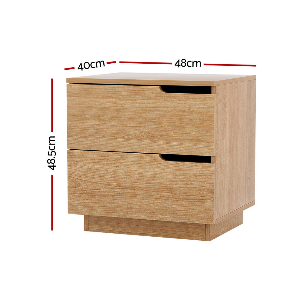 Newrybar pine two drawer bedside table with air gap handles in a contemporary bedroom