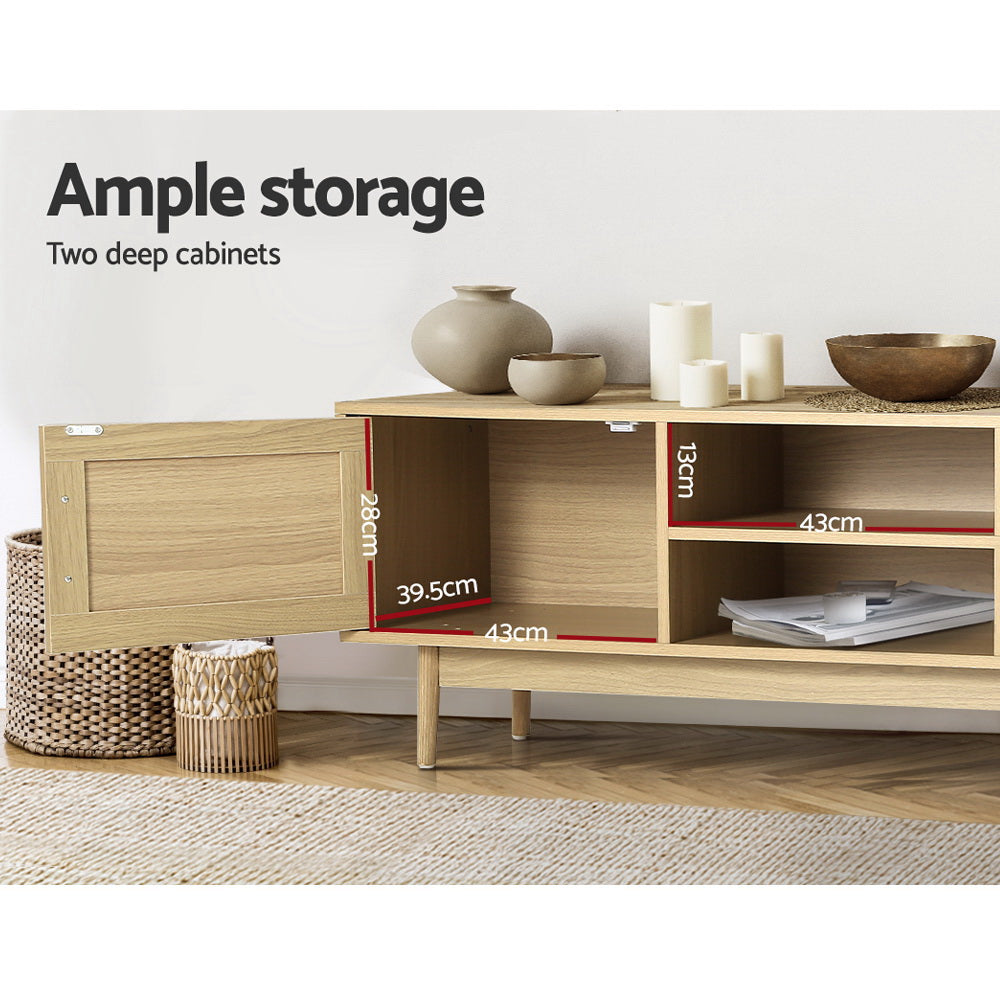 Evandale 180cm natural rattan entertainment unit with cabinets and open shelves in a coastal living room