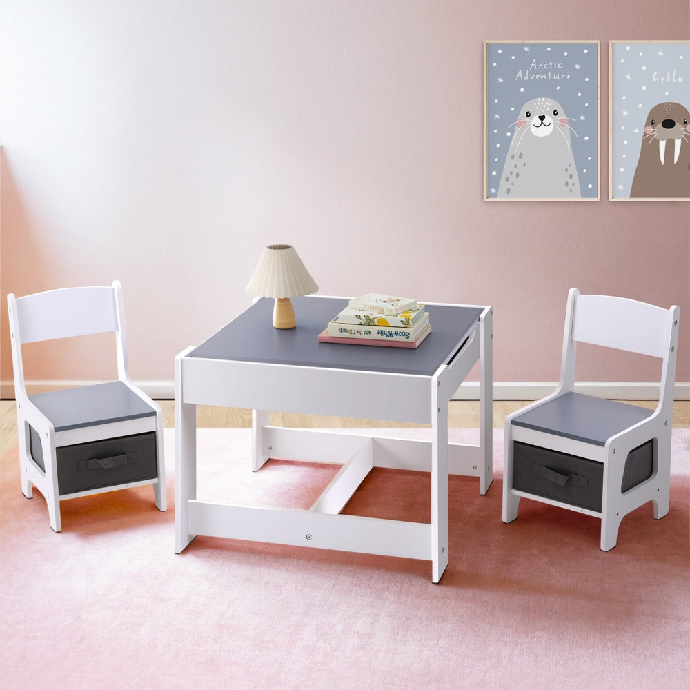 Kids table and two chairs set with chalkboard top and storage in white and grey