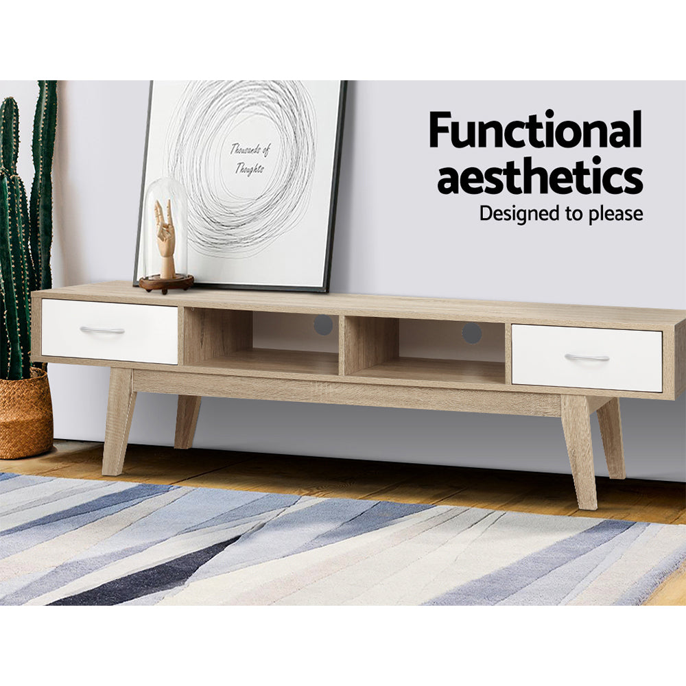 Latrobe 180cm oak and white Scandinavian entertainment unit with splayed legs in a modern living room