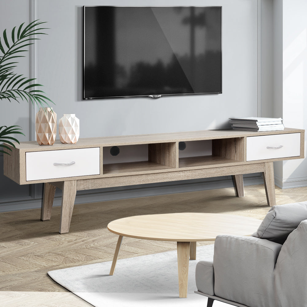 Latrobe 180cm oak and white Scandinavian entertainment unit with splayed legs in a modern living room